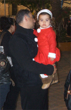 Girl in her Santa outfit