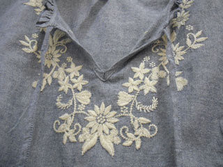 Embroidery round a collar