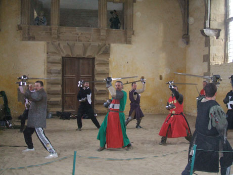 Sword training at Bolsover Castle - Cameron in red and green, De La Zouche in red with yellow spots