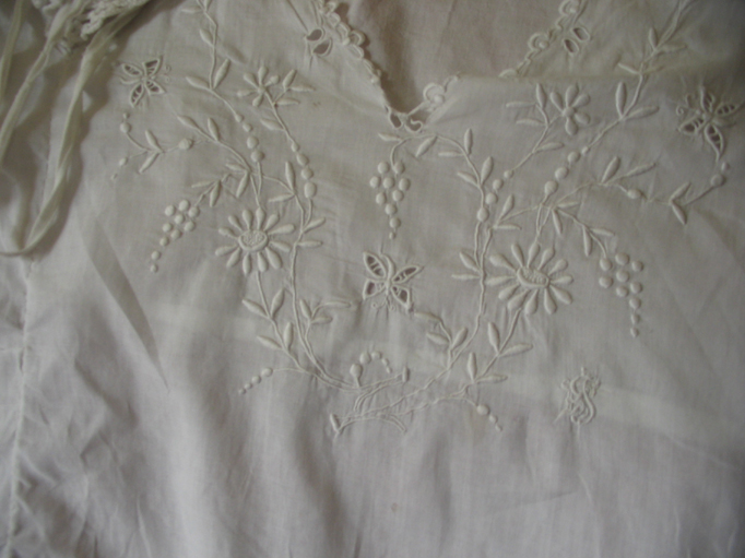 Whitework detail on the nightgown