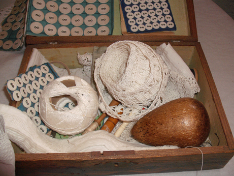 The sewing box from the attic complete with darning egg and buttons!
