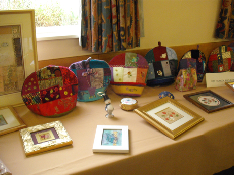Crazy patchwork tea cosies made at one of the day schools