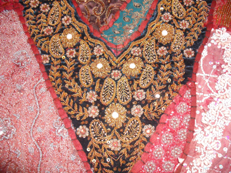 Detail of the wonderful goldwork in the centre of the hanging