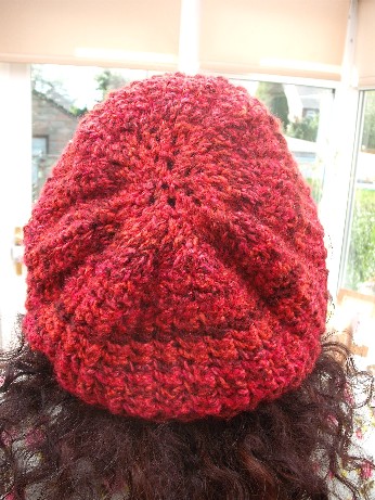 Red chunky hat modelled