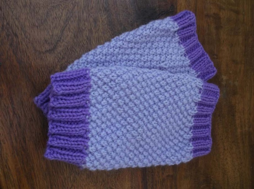Ellie's purple wristwarmers