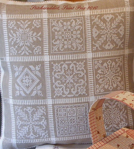 Cross stitch snowflake cushion on linen