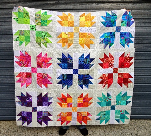 Scrappy bear paw quilt
